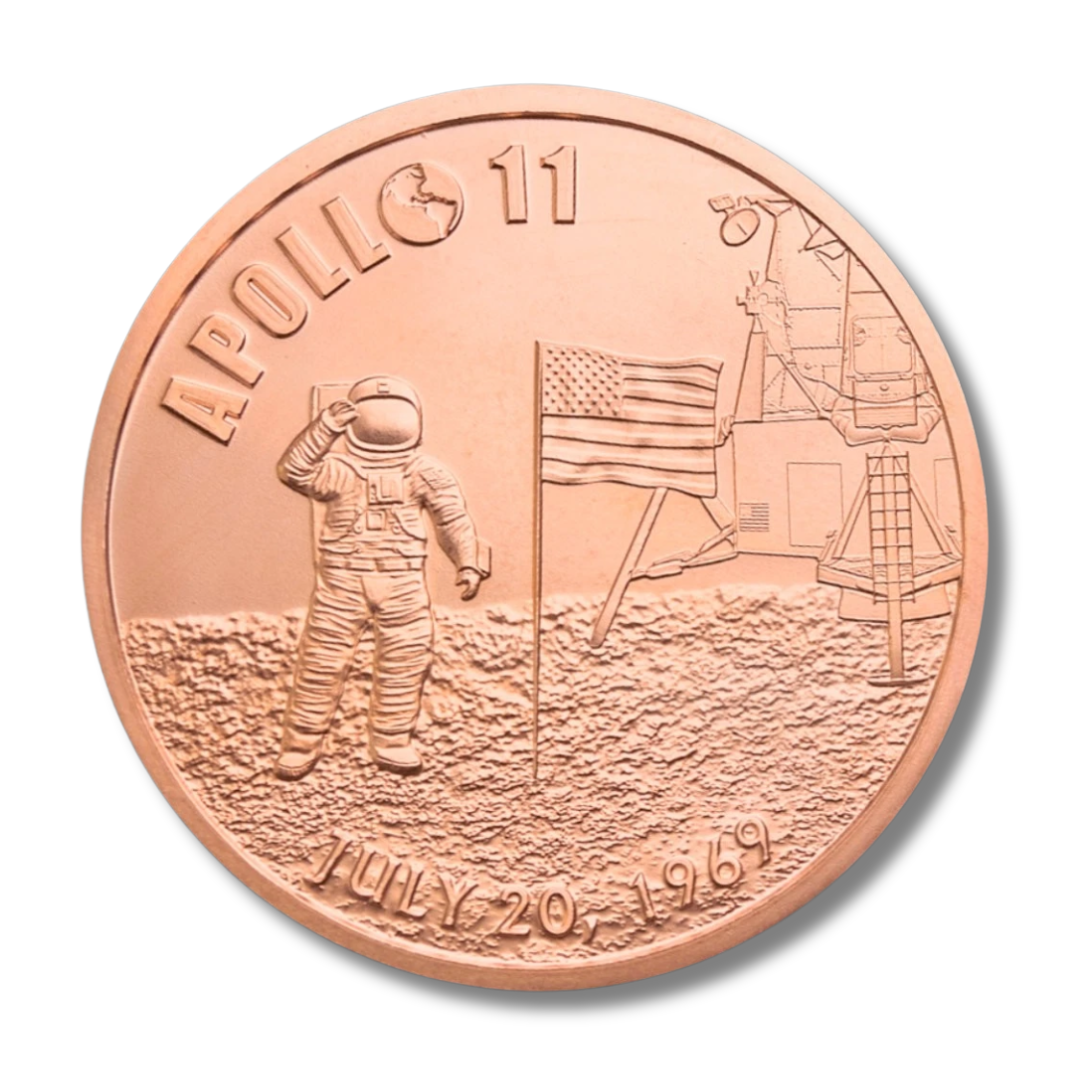 Close-up of Apollo 11 copper round obverse showing astronaut on lunar surface, American flag, Apollo lander, and July 20 1969 date